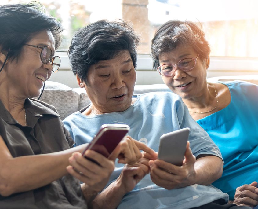 Senior women using smart phones